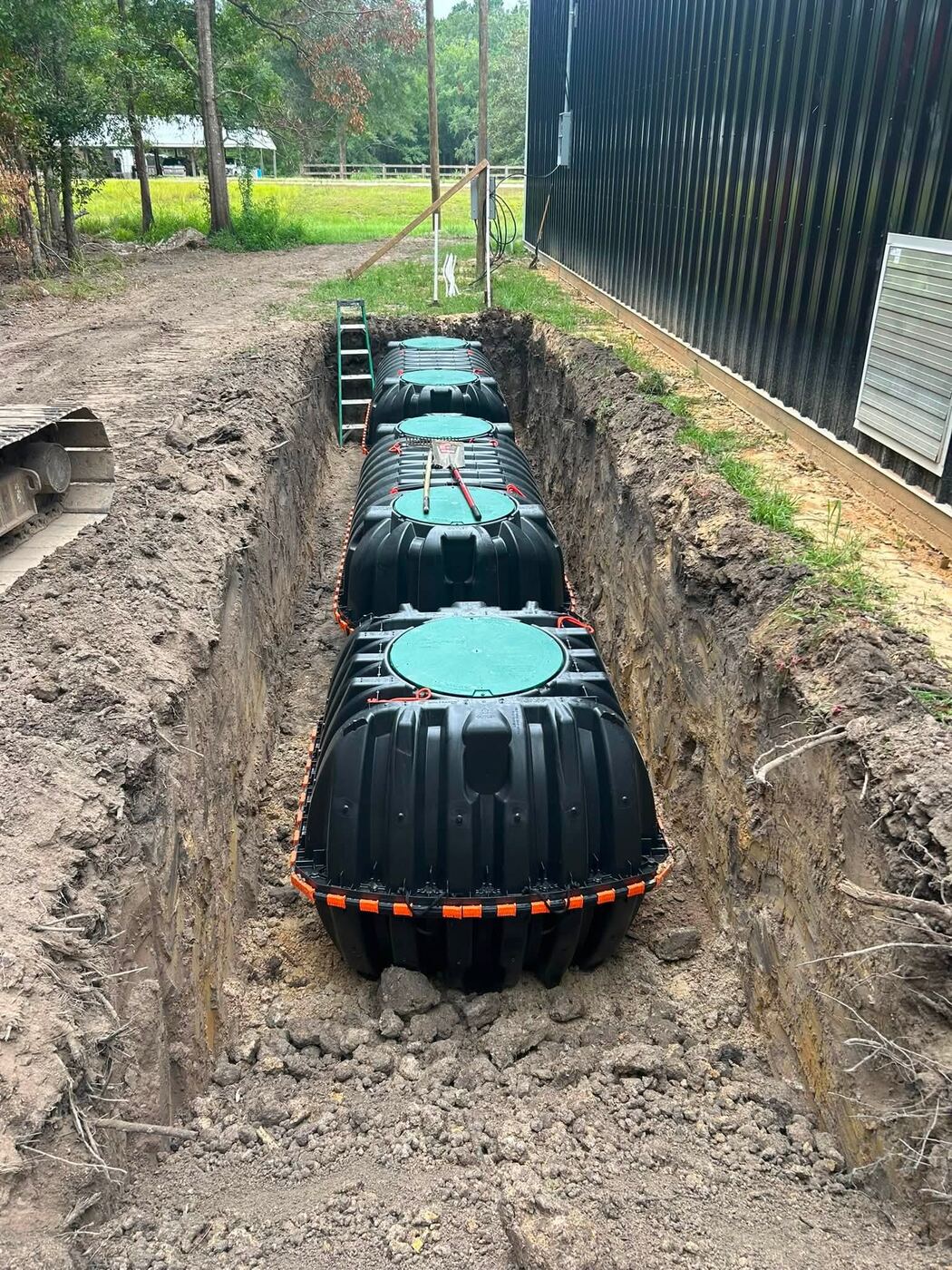 Septic tank set in trench
